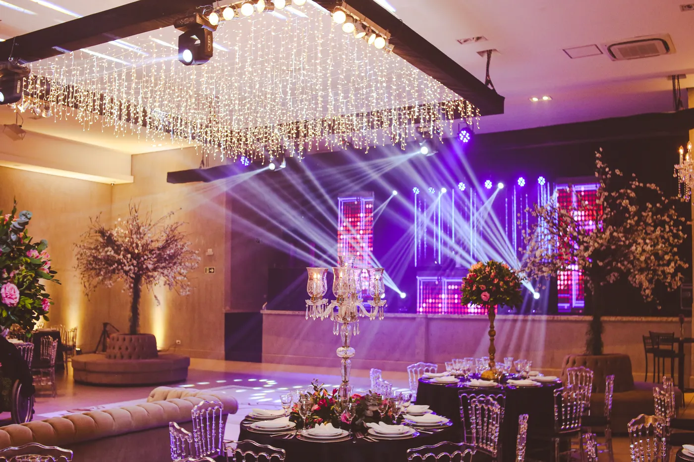 Banquet hall interior with stage lighting in a spacious event venue